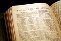 Photo of Bible open to The Acts of the Apostles, written by Luke