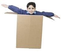 Boy in a box pretending he is flying a plane