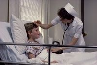 A nurse showing compassion to a young patient.