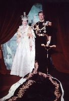 Queen Elizabeth II and Prince Philip, Duke of Edinburgh. Coronation portrait, June 1953, London, England. Wikimedia Commons, Credit: Library and Archives Canada.