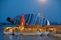 Shipwreck of Costa Concordia, which went aground under the command of Captain Francesco Schettino (Wikimedia Commons, Rvongher).