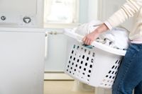 Basket full of dirty clothes to be cleaned.