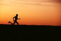 Endurance runner going the distance to symbolize persistence in prayer