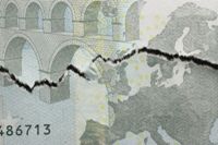 Torn euro illustrating the crisis in the eurozone