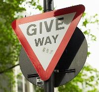 Give Way sign to illustrate the way of give vs. the way of get