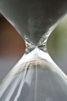 Close-up photo of an hourglass, representing the passing of time.