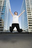 Photo of girl jumping for joy
