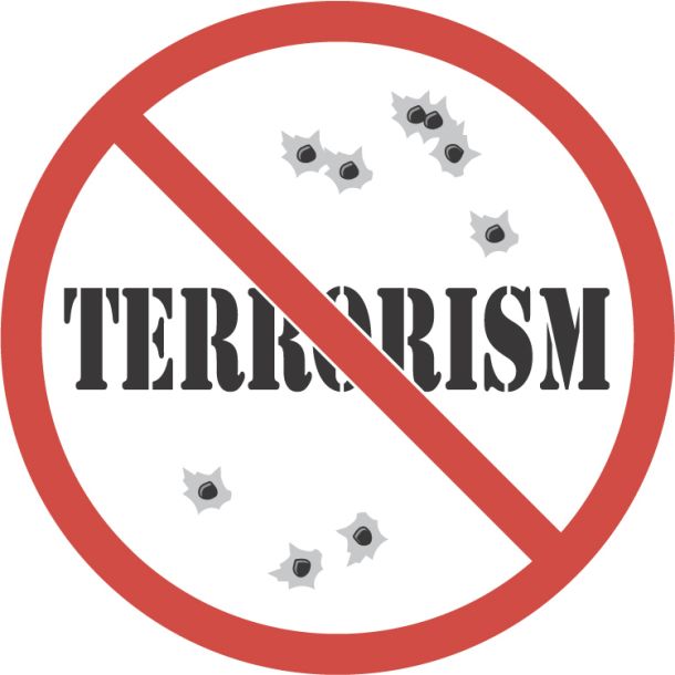 No terrorism sign with bullet holes