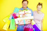 Photo of man and woman shopping and getting more and more