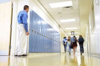 Teacher watching students in the hallway: how would you judge?