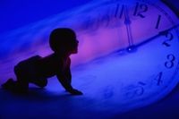 Photo composite of a baby and a clock in motion, illustrating how time flies