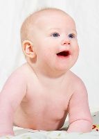 Photo of a baby looking intently, soaking everything into its amazing brain.