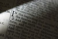 Bible open to Genesis 1:1: