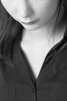 Black and white photo of girl looking down