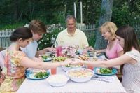 Family praying together.