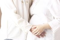 Father-to-be with his pregnant wife