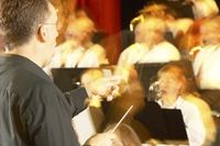 Photo of an orchestra, representing the performance of Handel's