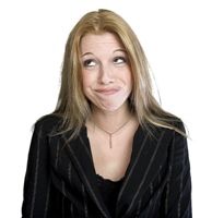 Regretful, not repentant, young woman's facial expression