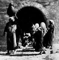 Women at a well.